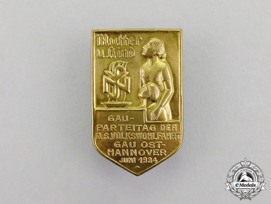 germany._a1934_national_socialist_people’s_welfare_regional_party_day_badge_c2017_001184