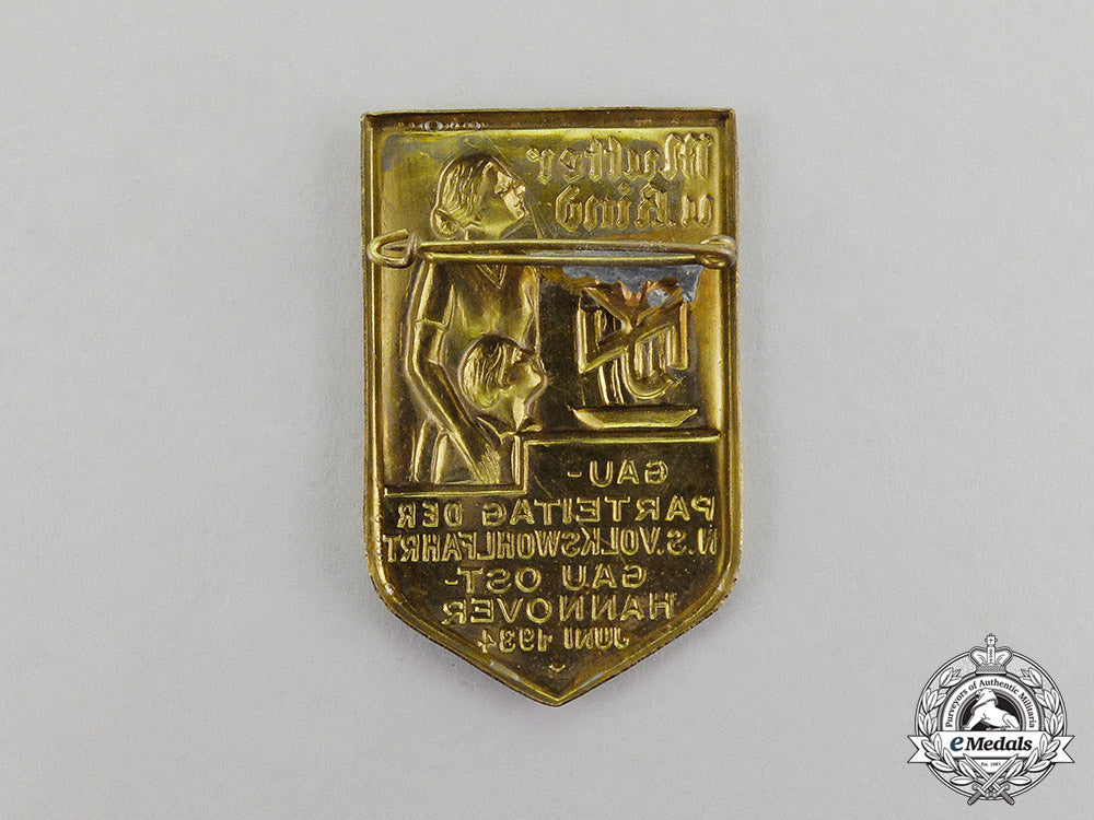 germany._a1934_national_socialist_people’s_welfare_regional_party_day_badge_c2017_001185