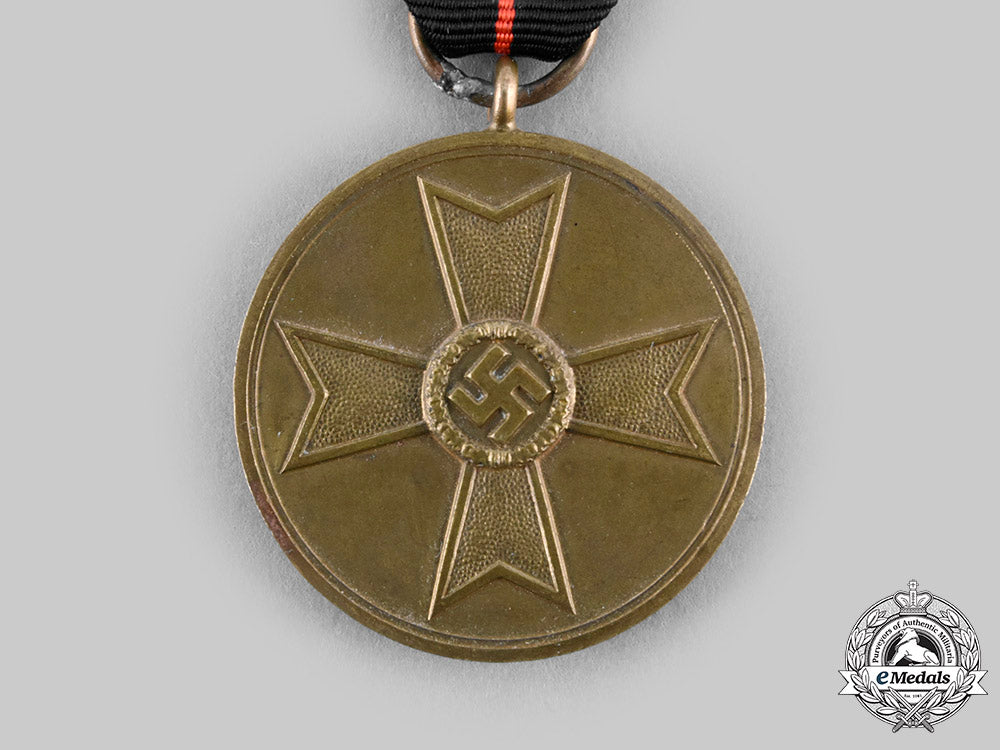 germany,_third_reich._a1939_war_merit_medal_with_award_document_to_administrative_auxiliary_josefa_decken,_c.1944_c20200_emd3287