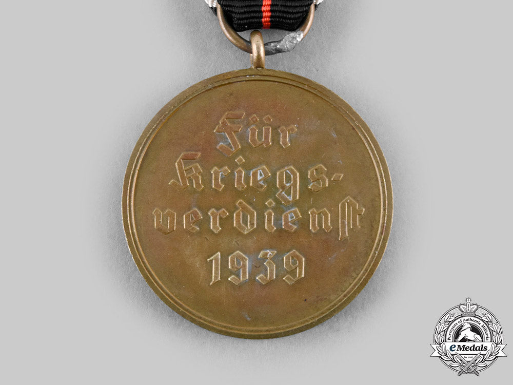 germany,_third_reich._a1939_war_merit_medal_with_award_document_to_administrative_auxiliary_josefa_decken,_c.1944_c20201_emd3285