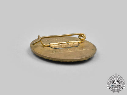 germany,_nsdap._a_golden_party_badge,_large_version,_by_deschler&_sohn_c2020_066_mnc0694_1