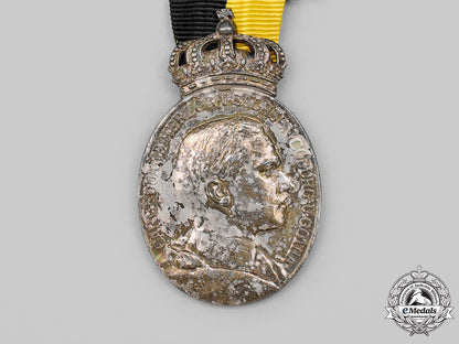 saxe-_coburg_and_gotha,_duchy._a_duke_carl_eduard_medal,_military_division_in_silver_with_crown_c2020_128_mnc0437