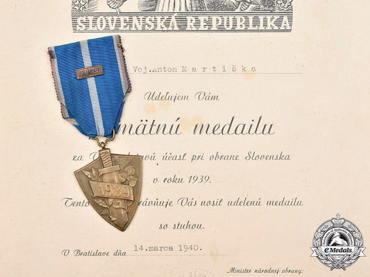 slovakia,_i_republic._a_defence_of_slovakia_medal,_type_i_with_award_document_c2020_134_mnc1428