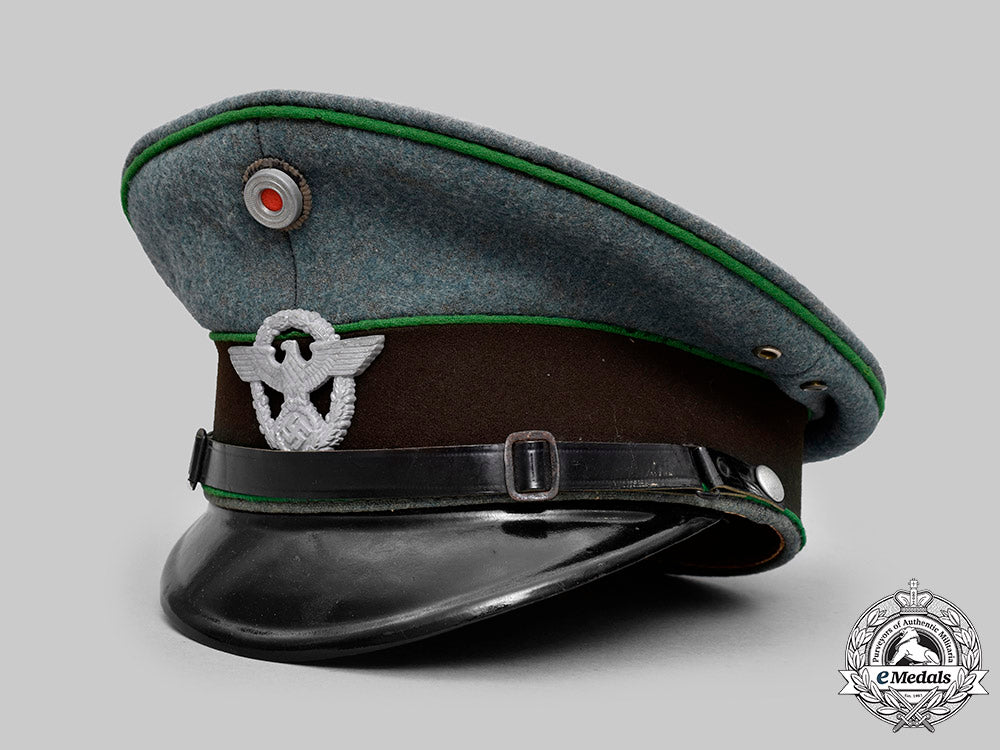 germany,_schutzpolizei._an_em/_nco’s_visor_cap,_by_carl_isken_c2020_150_mnc7969
