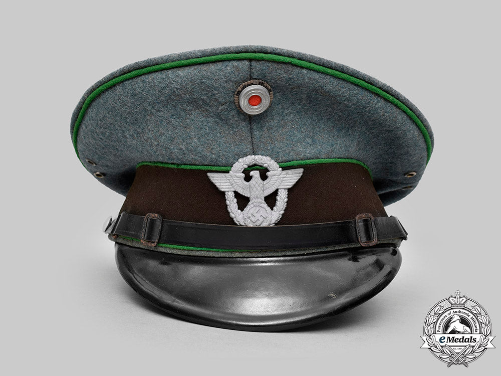 germany,_schutzpolizei._an_em/_nco’s_visor_cap,_by_carl_isken_c2020_151_mnc7971