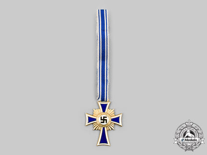 germany,_third_reich._an_honour_cross_of_the_german_mother,_gold_grade_with_case,_by_robert_hauschild_c2020_211_mnc4658_1