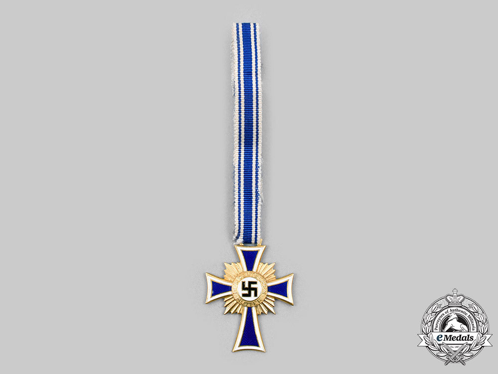 germany,_third_reich._an_honour_cross_of_the_german_mother,_gold_grade_with_case,_by_robert_hauschild_c2020_211_mnc4658_1