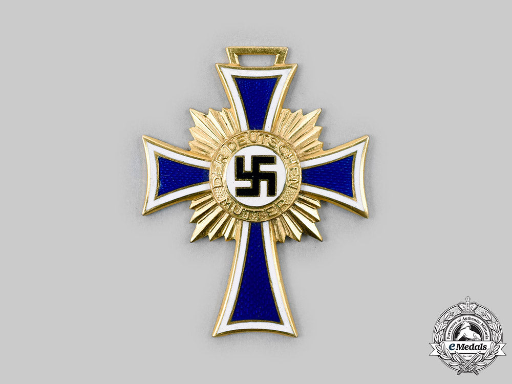 germany,_third_reich._an_honour_cross_of_the_german_mother,_gold_grade_with_case,_by_robert_hauschild_c2020_212_mnc4663_1