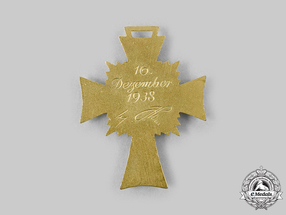 germany,_third_reich._an_honour_cross_of_the_german_mother,_gold_grade_with_case,_by_robert_hauschild_c2020_213_mnc4665_1