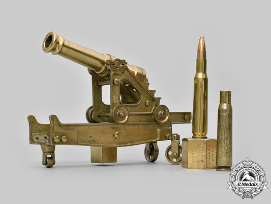 united_states._a_brass_model_cannon_with_trench_art_shells_c2020_222_mnc2663