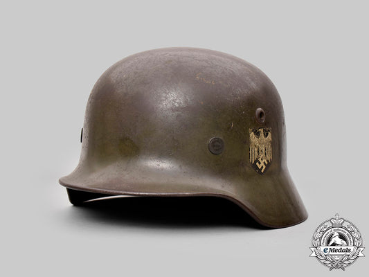 germany,_heer._an_m40_double-_decal_steel_helmet,_owner-_attributed,_by_f.w._quist_c2020_3139_mnc1647_1