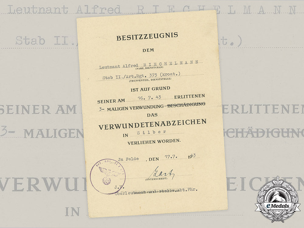 germany,_heer._a_silver_grade_wound_badge_award_document_to_leutnant_alfred_riechelmann,_anti-_partisan_unit_c2020_313emd_026_1_1