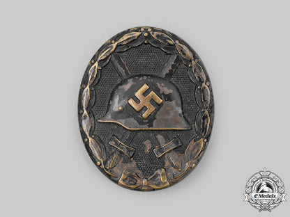 germany,_heer._a_black_grade_wound_badge,_with_award_document,_to_gefreiter_franz_held_c2020_363_mnc4776