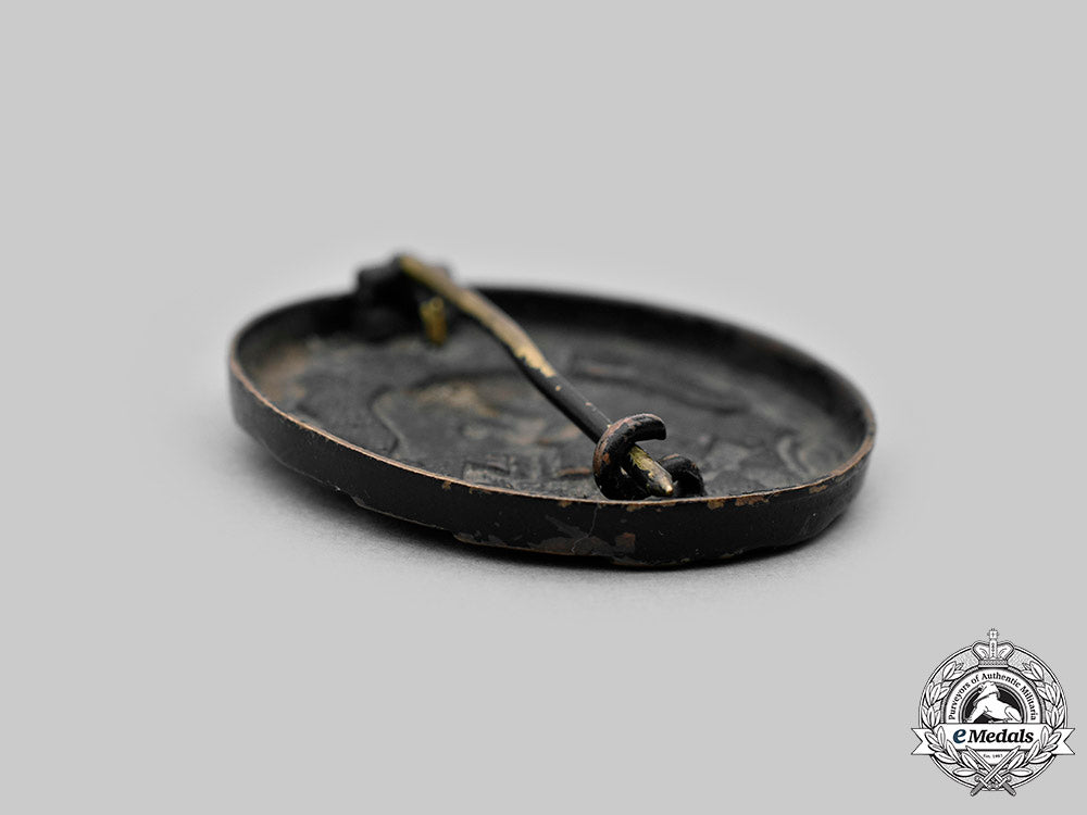 germany,_heer._a_black_grade_wound_badge,_with_award_document,_to_gefreiter_franz_held_c2020_365_mnc4784