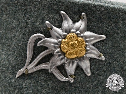 germany,_wehrmacht._a_heer_gebirgsjäger_em/_nco’s_mountain_cap,_by_hans_schildberger_c2020_395_mnc9453_1