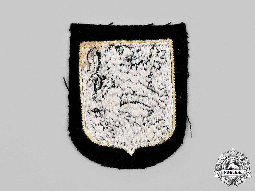 germany,_ss._a_rare_flemish_legion_sleeve_shield_c2020_399_mnc1522_1