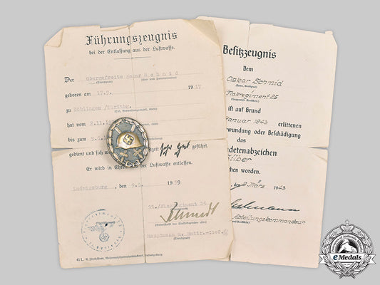 germany,_wehrmacht._a_silver_grade_wound_badge,_with_documents,_to_wachtermeister_oskar_schmid_c2020_399_mnc3648_1_1