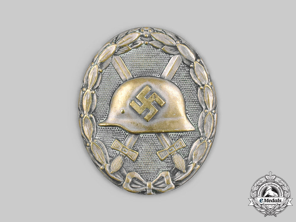germany,_wehrmacht._a_silver_grade_wound_badge,_with_documents,_to_wachtermeister_oskar_schmid_c2020_400_mnc3655_1_1