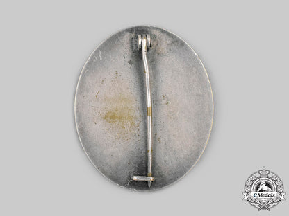germany,_wehrmacht._a_silver_grade_wound_badge,_with_documents,_to_wachtermeister_oskar_schmid_c2020_401_mnc3657_1_1