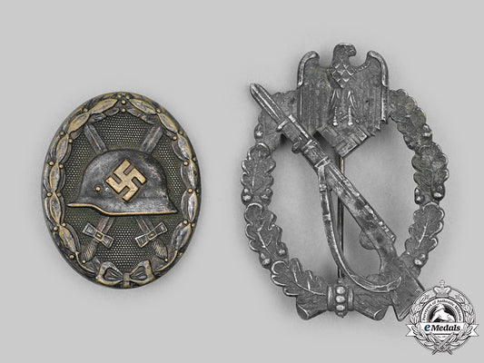 germany,_wehrmacht._a_pair_of_service_badges_c2020_410_mnc4906_1