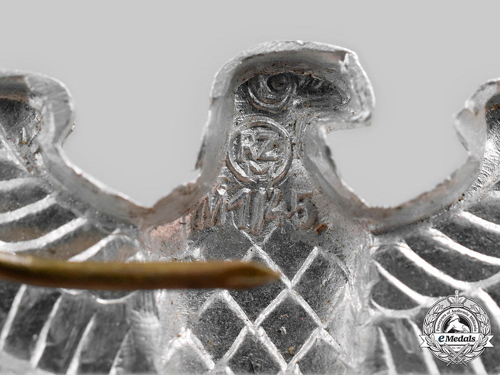 germany,_third_reich._a_mixed_lot_of_eagle_cap_insignia_c2020_416_mnc3972