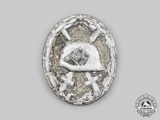 germany,_wehrmacht._a_wound_badge,_silver_grade,_by_carl_wild_c2020_436_mnc1619_1_1