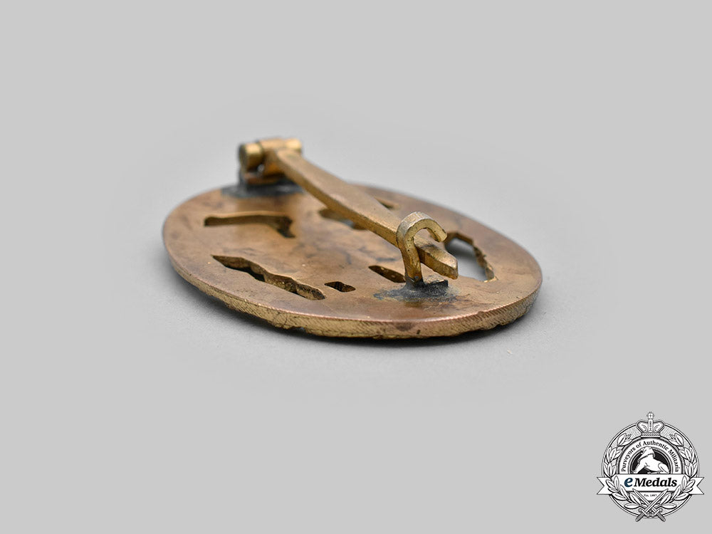 germany,_third_reich._a_rare_defence_economy_leader_badge,_with_case_and_stick_pin_miniature_c2020_440_mnc9608_1