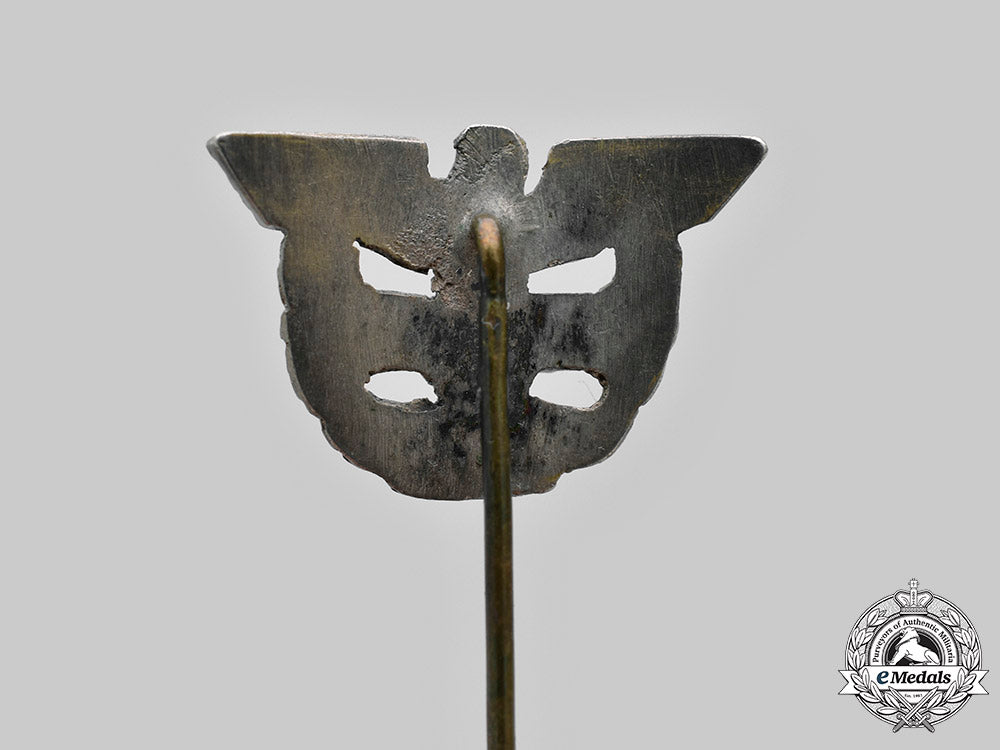 germany,_third_reich._a_rare_defence_economy_leader_badge,_with_case_and_stick_pin_miniature_c2020_442_mnc9614_1