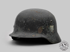 Germany, Heer. A Battle-Damaged Heer M40 Steel Helmet