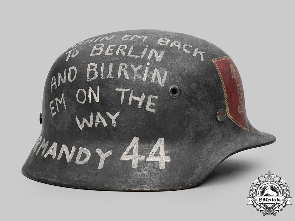 united_states._a_wehrmacht_m40_steel_helmet_with_g.i._souvenir_painting,1_st_infantry_division_c2020_582_mnc3096