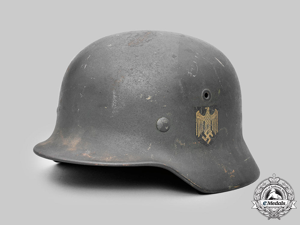 germany,_heer._a_single_decal_m40_steel_helmet,_by_f.w._quist_c2020_590_mnc3137_1
