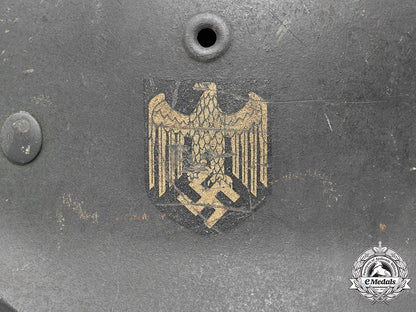 germany,_heer._a_single_decal_m40_steel_helmet,_by_f.w._quist_c2020_596_mnc3144_1