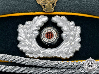 germany,_heer._a_rare_armoured_cavalry/_reconnaissance_officer’s_visor_cap_with_schwedter_eagle_tradition_badge,_by_erel_c2020_659_mnc2267