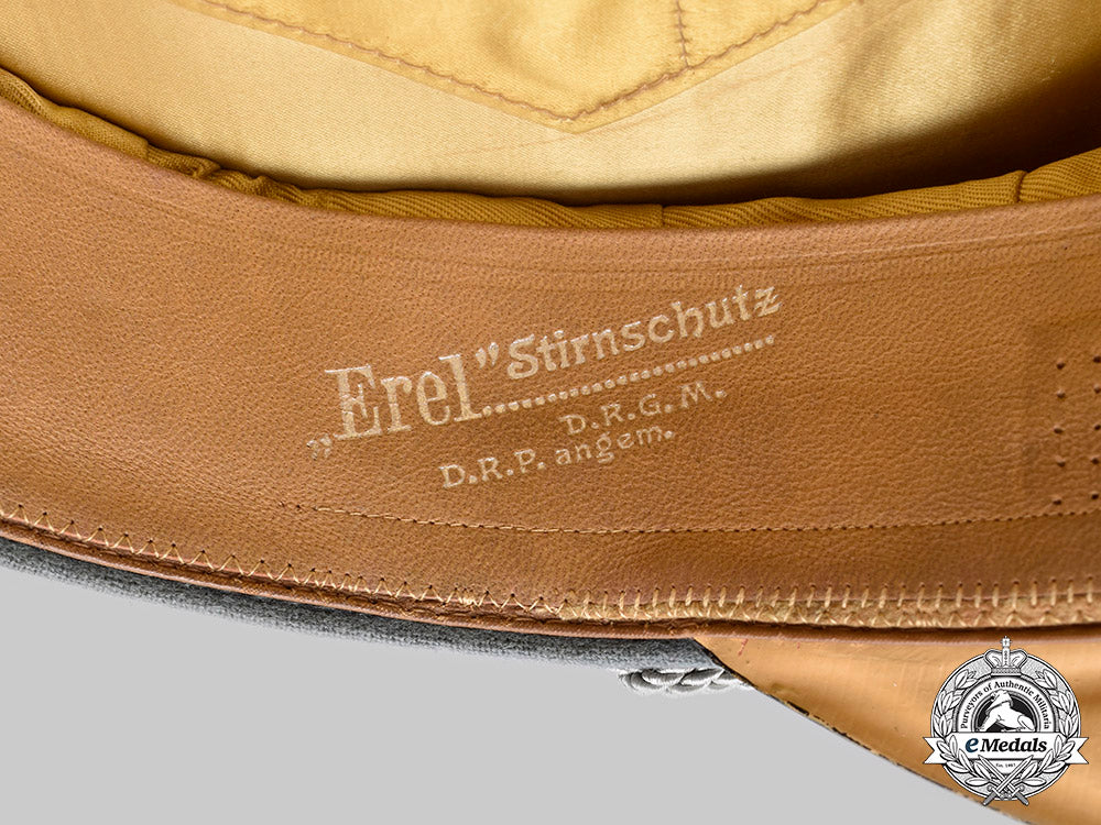 germany,_heer._a_rare_armoured_cavalry/_reconnaissance_officer’s_visor_cap_with_schwedter_eagle_tradition_badge,_by_erel_c2020_662_mnc2277