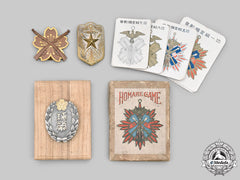 Japan, Empire. A Lot Of Three Badges And A Homare Game