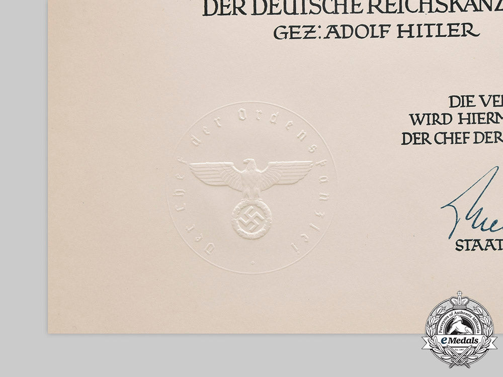 germany,_third_reich._an_award_document_for_order_of_the_german_eagle,_merit_medal_with_swords,_to_a_spanish_recipient_c2020_719_mnc9970_1