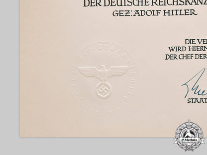 germany,_third_reich._an_award_document_for_order_of_the_german_eagle,_merit_medal_with_swords,_to_a_spanish_recipient_c2020_719_mnc9970_1