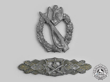 germany,_wehrmacht._a_pair_of_service_badges_c2020_792_mnc3274