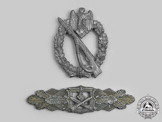 germany,_wehrmacht._a_pair_of_service_badges_c2020_792_mnc3274