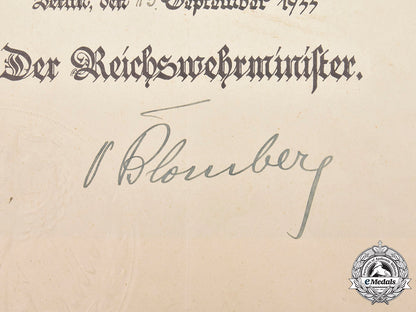 germany,_third_reich._an_award_document_with_werner_von_blomberg_signature_c2020_929emd_296_1