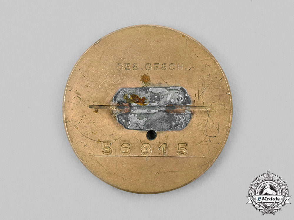 germany,_nsdap._a_golden_party_badge,_by_deschler&_sohn_c2020_970_mnc4002_1_1_1_1_1_1
