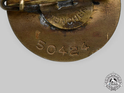 germany,_nsdap._a_golden_party_badge,_small_version,_by_josef_fuess_c2020_981_mnc4028_1_1