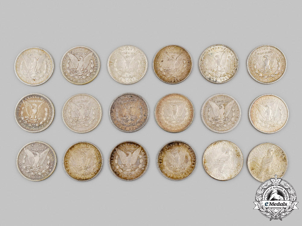 united_states._a_lot_of_sixteen_silver_morgan_dollar_coins&_two_peace_silver_dollars_c2021_013_mnc1875