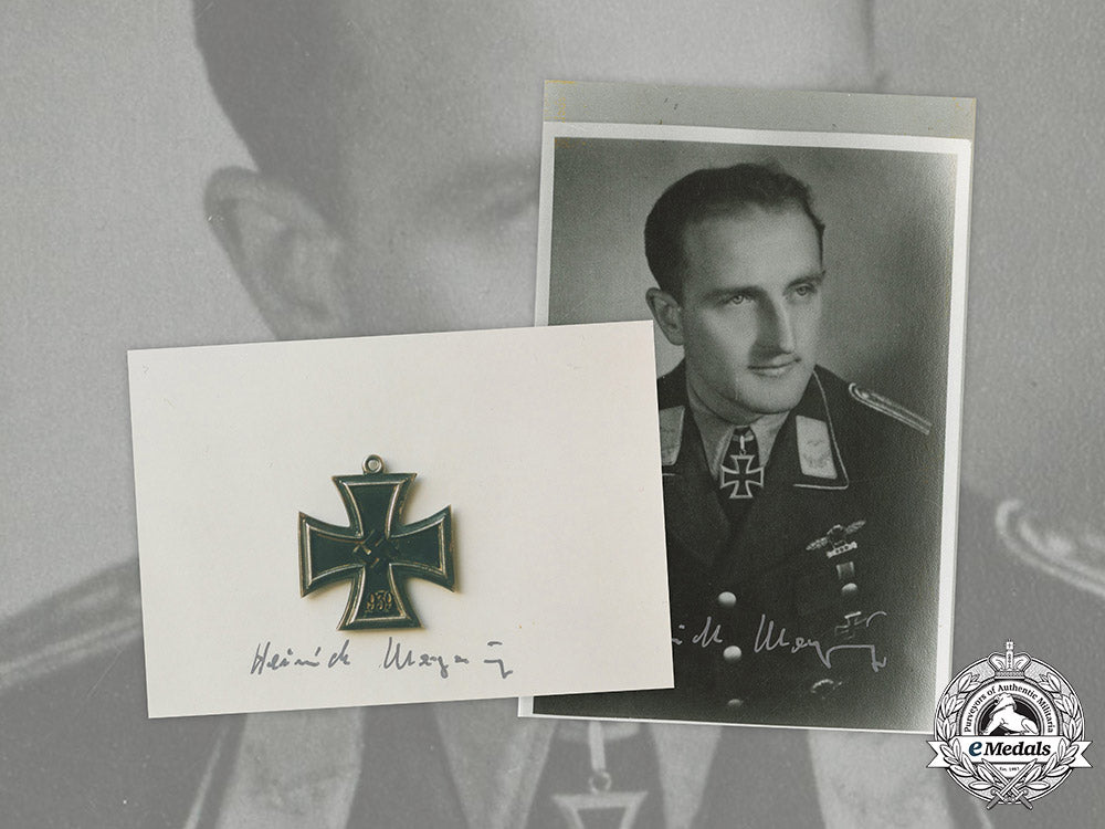 germany,_luftwaffe._a_pair_of_postwar_signed_photos_of_stuka_ace_heinrich_meyering_c2021_085document-copy-_1_