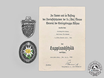 germany,_heer._a_lappland_shield,_with_award_document_and_insignia,_to_stabsgefreiter_emilian_fleißner_c2021_168_mnc5403_1