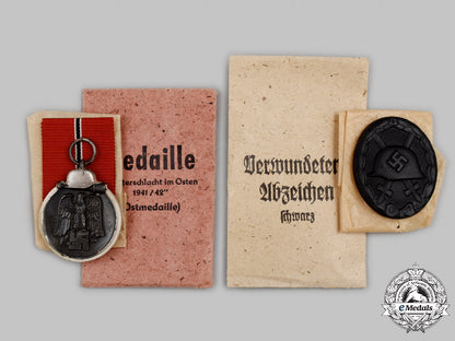 germany,_wehrmacht._a_pair_of_mint_and_unissued_service_decorations_c2021_268emd_3256