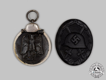 germany,_wehrmacht._a_pair_of_mint_and_unissued_service_decorations_c2021_269emd_3262
