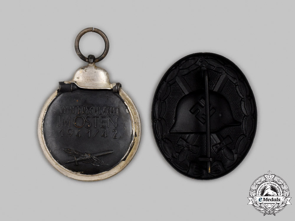germany,_wehrmacht._a_pair_of_mint_and_unissued_service_decorations_c2021_270emd_3264