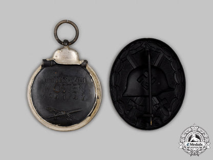 germany,_wehrmacht._a_pair_of_mint_and_unissued_service_decorations_c2021_270emd_3264