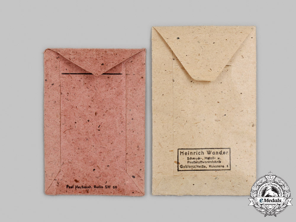germany,_wehrmacht._a_pair_of_mint_and_unissued_service_decorations_c2021_274emd_3260